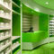 Armadietto di esposizione alla moda della farmacia, farmacia al minuto verde che accantona multi combinazione fornitore